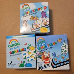 Curad Bandaids Vintage Lot McDonald's Santa Dinosaur